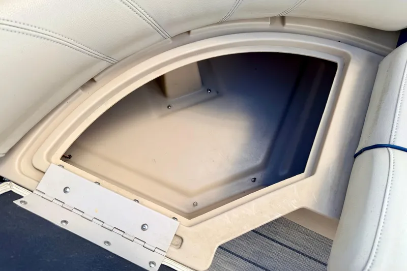 Slide: The Image of Storage compartment in 2018 Sylvan 8522 Mirage Fish boat with beige upholstery. - 24