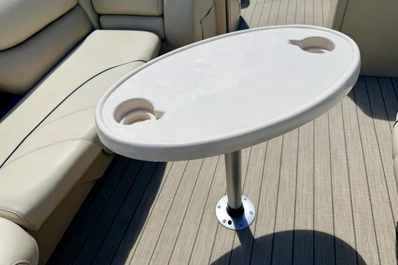 Slide: The Image of Oval table with cup holders on 2018 Sylvan 8522 Mirage Fish boat. - 27