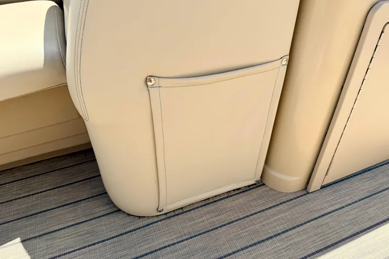 Slide: The Image of 2018 Sylvan 8522 Mirage Fish boat interior with beige upholstery and striped flooring. - 34