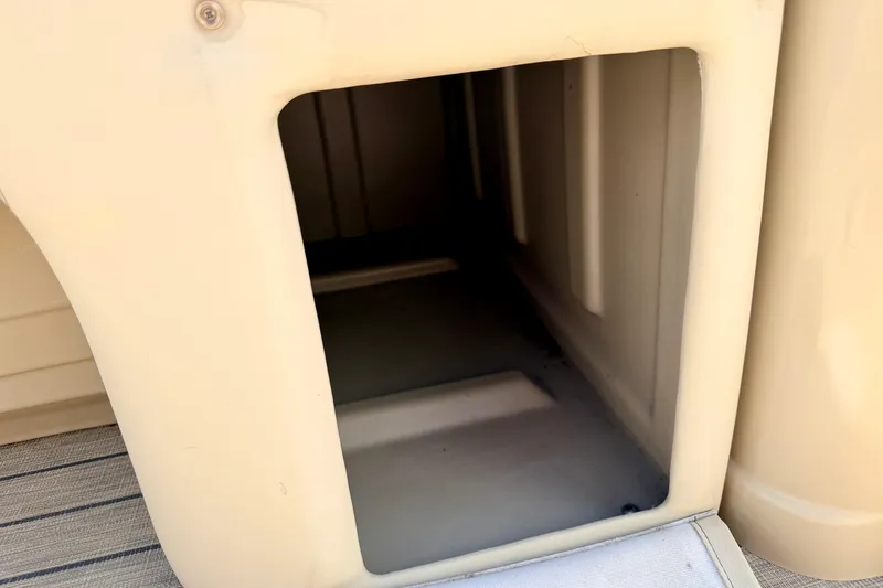 Slide: The Image of Storage compartment of 2018 Sylvan 8522 Mirage Fish boat, beige interior. - 35