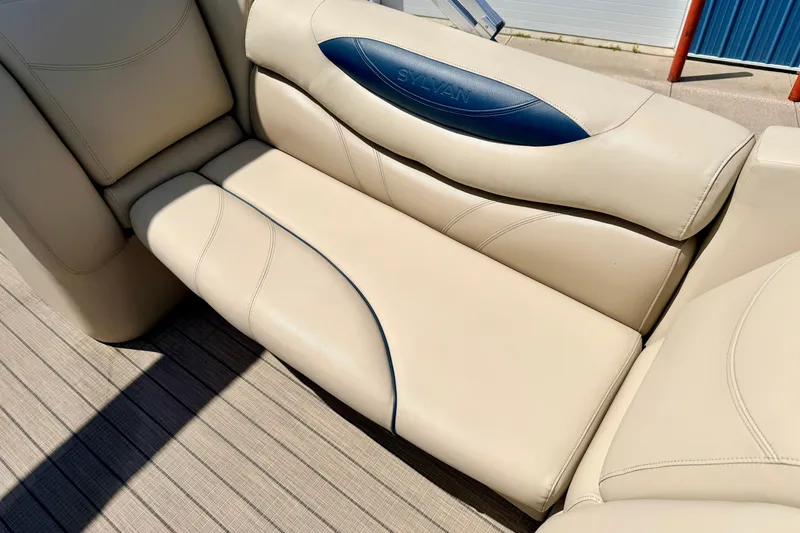 Slide: The Image of 2018 Sylvan 8522 Mirage Fish boat interior with beige leather seating. - 36