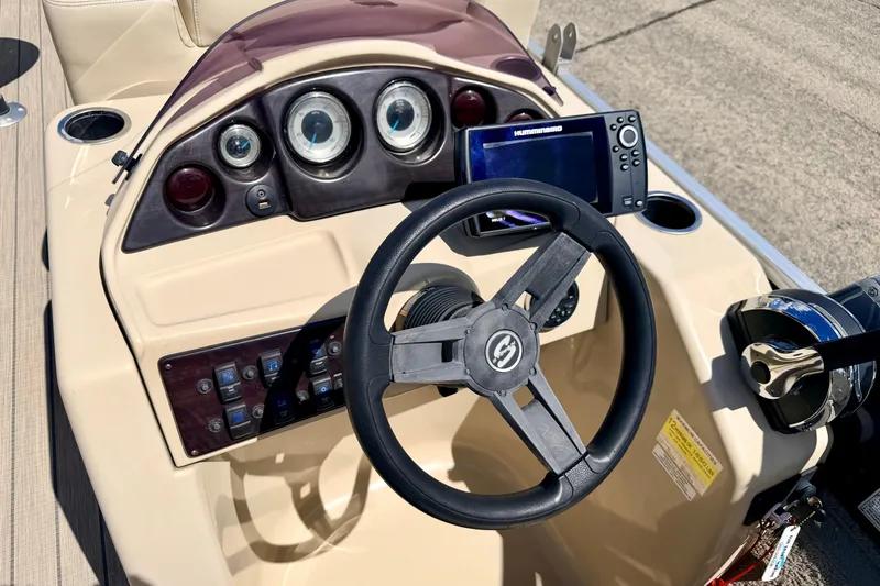 Slide: The Image of Steering console of 2018 Sylvan 8522 Mirage Fish boat with gauges and navigation system. - 39