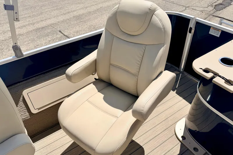 Slide: The Image of Luxurious beige captain's chair on 2018 Sylvan 8522 Mirage Fish boat deck. - 48