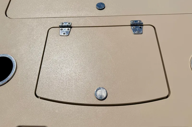 Slide: The Image of 2018 Sylvan 8522 Mirage Fish boat hatch with metal hinges and circular handle. - 51