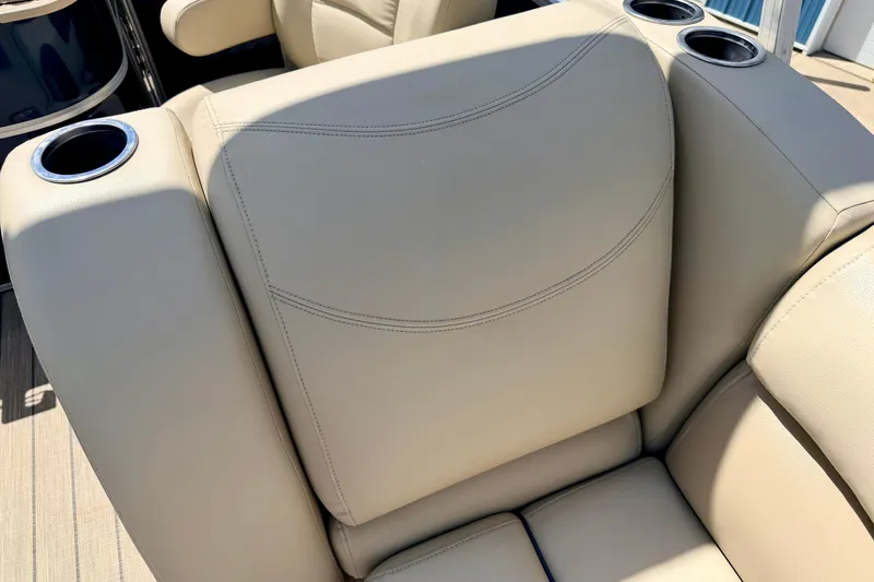 Slide: The Image of Beige seating with cup holders on a 2018 Sylvan 8522 Mirage Fish boat. - 63