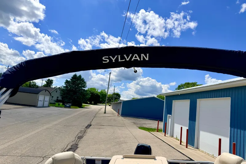 Slide: The Image of 2018 Sylvan 8522 Mirage Fish boat with canopy on a sunny day. - 65