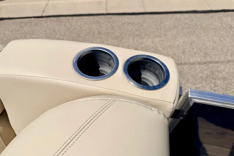 Slide: The Image of Cup holders on beige seating of 2018 Sylvan 8522 Mirage Fish boat. - 68