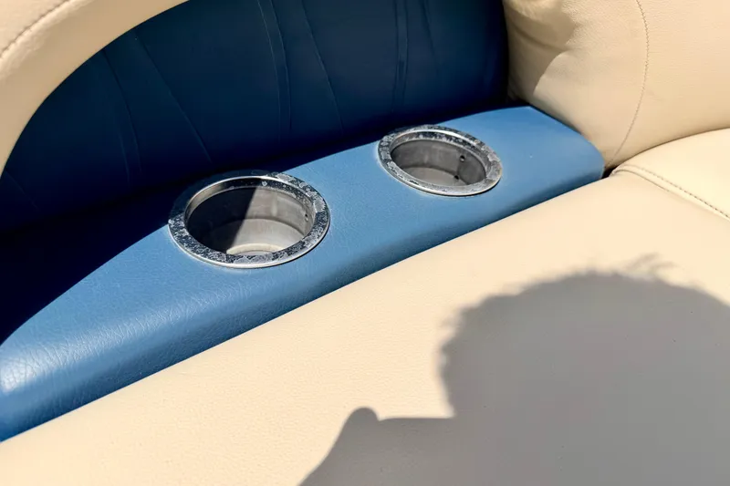 Slide: The Image of Cup holders on beige and blue seating of 2018 Sylvan 8522 Mirage Fish boat. - 69