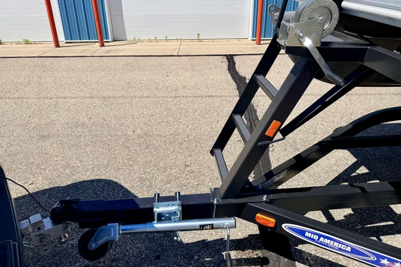 Slide: The Image of Trailer hitch and winch of a 2018 Sylvan 8522 Mirage Fish boat. - 79