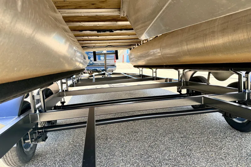 Slide: The Image of Underneath view of a 2018 Sylvan 8522 Mirage Fish pontoon boat on a trailer. - 83