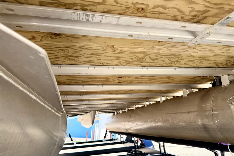 Slide: The Image of Underneath view of a 2018 Sylvan 8522 Mirage Fish pontoon boat, showcasing its structure. - 9