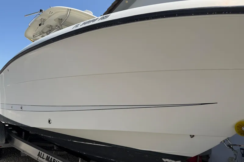 Slide: The Image of 2008 Hydra-Sports Vector 2900 CC boat on trailer, side view, clear sky background. - 2