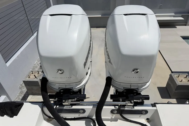 Slide: The Image of Twin outboard motors on a 2008 Hydra-Sports Vector 2900 CC boat. - 24