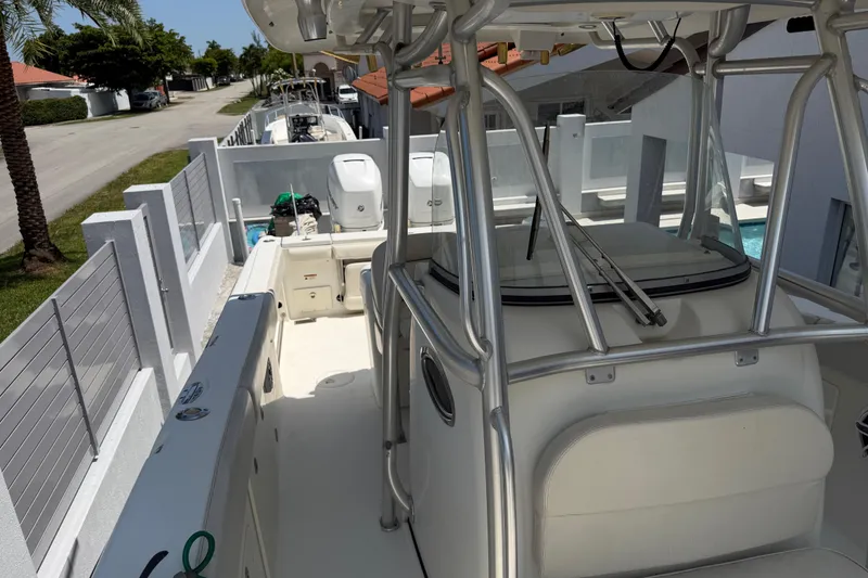Slide: The Image of 2008 Hydra-Sports Vector 2900 CC boat docked near a residential area. - 31