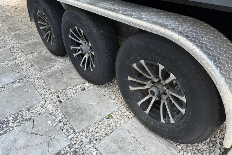 Slide: The Image of Trailer wheels on gravel, supporting a 2008 Hydra-Sports Vector 2900 CC boat. - 38