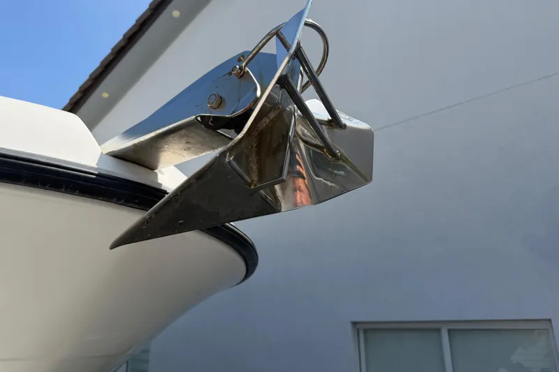 Slide: The Image of Close-up of a 2008 Hydra-Sports Vector 2900 CC boat anchor against a building background. - 5