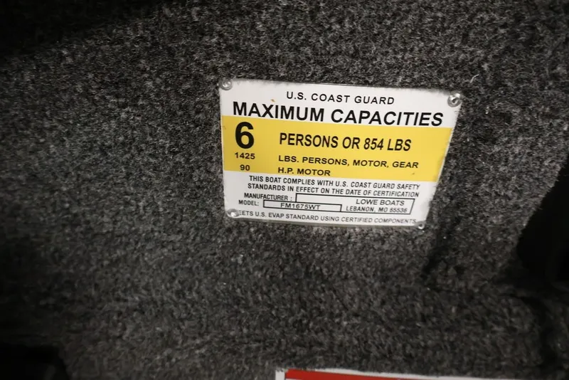 Slide: The Image of Capacity label on 2027 Lowe Fishing Machine 1675WT, 6 persons or 854 lbs. - 38