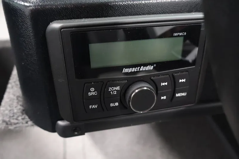 Slide: The Image of Impact Audio control panel in 2027 Lowe Fishing Machine 1675WT boat. - 36
