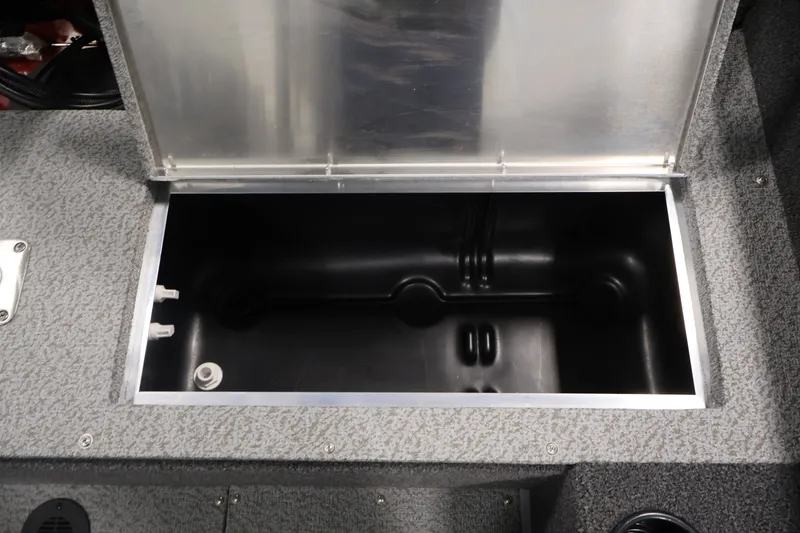 Slide: The Image of Open storage compartment in 2027 Lowe Fishing Machine 1775SC boat. - 32