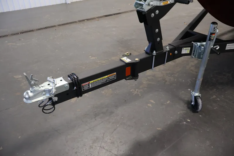 Slide: The Image of Trailer hitch of 2027 Lowe Fishing Machine 1775SC on a concrete floor. - 38