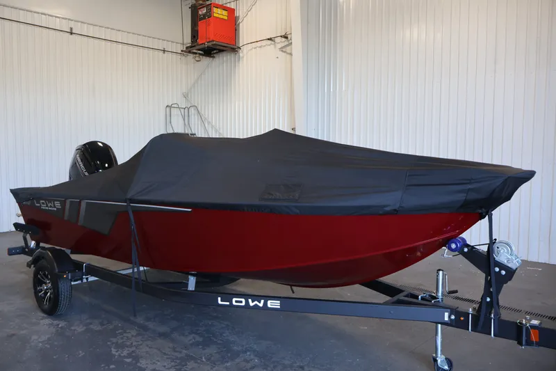 Slide: The Image of 2027 Lowe Fishing Machine 1775SC boat with cover in a garage setting. - 41