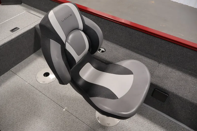Slide: The Image of 2027 Lowe Fishing Machine 1775SC boat seat, gray and black design, on deck. - 30