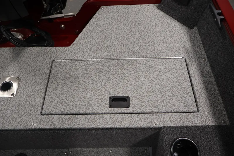 Slide: The Image of 2027 Lowe Fishing Machine 1775SC boat deck with storage compartment and cup holder. - 31