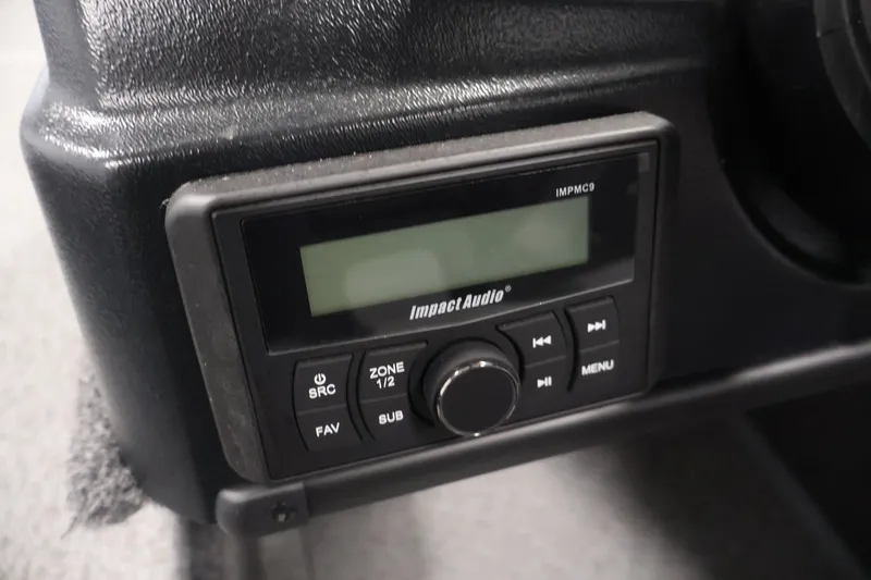 Slide: The Image of Audio control panel in 2027 Lowe Fishing Machine 1775SC boat dashboard. - 27