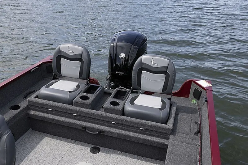 Slide: The Image of 2027 Lowe Fishing Machine 1775SC boat interior with dual seats on water. - 4