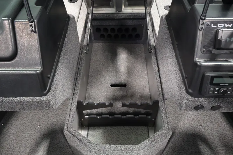 Slide: The Image of Interior of 2027 Lowe Fishing Machine 1875, featuring rod storage and control panel. - 15