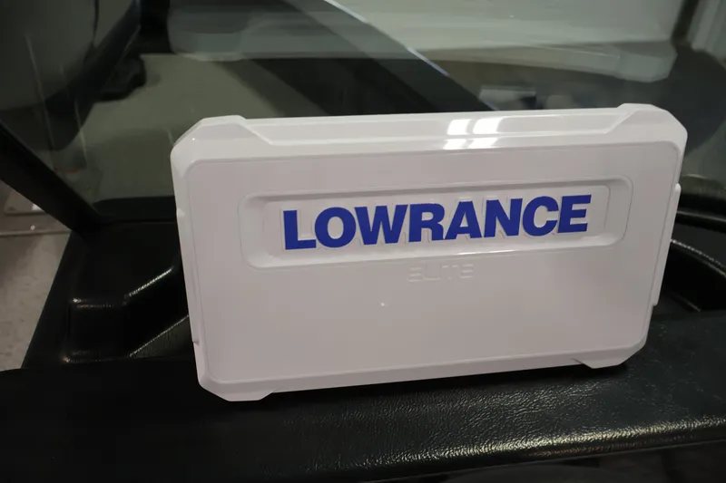Slide: The Image of Lowrance Elite device on 2027 Lowe Fishing Machine 1875 boat dashboard. - 19