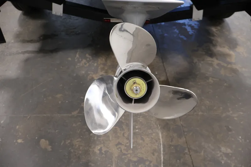 Slide: The Image of Propeller of 2027 Lowe Fishing Machine 1875 on concrete floor. - 40