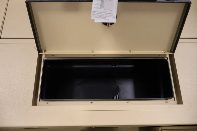 Slide: The Image of Open storage compartment of 2027 Lowe Roughneck RX1860 Tunnel Jet boat. - 13