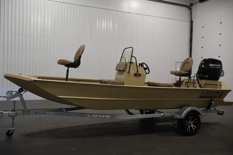 Slide: The Image of 2027 Lowe Roughneck RX1860 Tunnel Jet boat on trailer in indoor setting. - 7