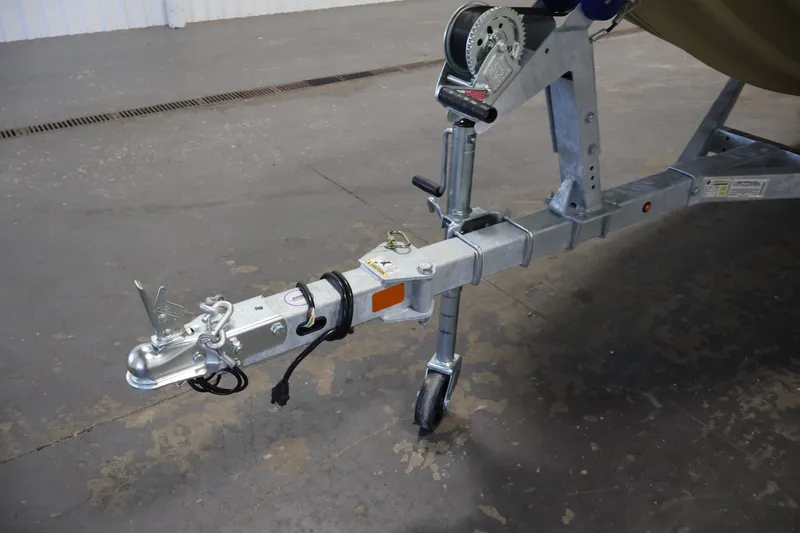 Slide: The Image of Trailer hitch of 2027 Lowe Roughneck RX1860 Tunnel Jet, featuring a sturdy metal frame. - 30
