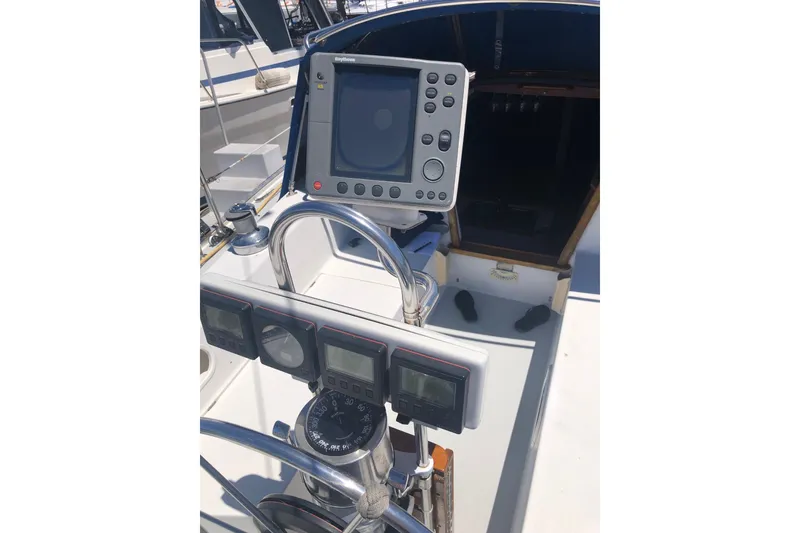 Slide: The Image of Cockpit of 1994 Catalina 36 MkII sailboat with navigation instruments and compass. - 22