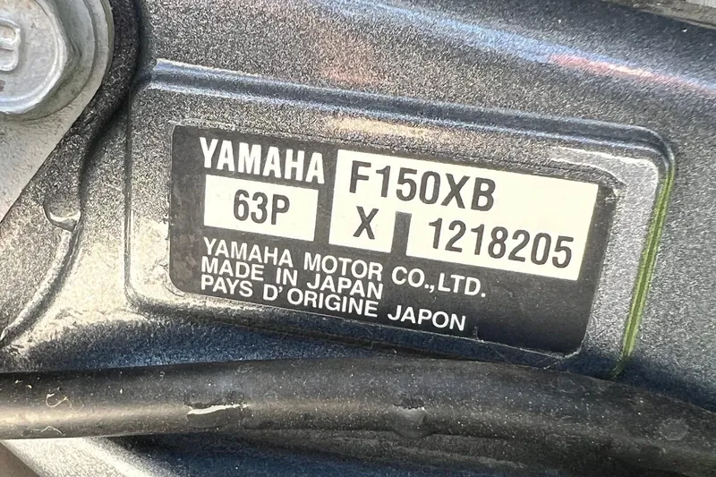Slide: The Image of Yamaha F150XB engine label on 2019 Cobia 220 Center Console boat. - 18