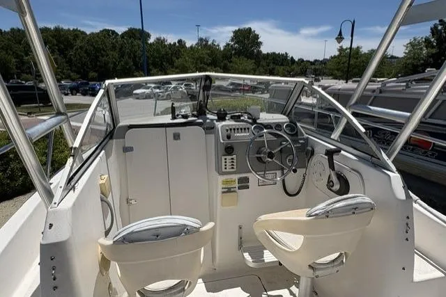 Slide: The Image of 2006 Trophy 1802 Walkaround boat interior with steering wheel and seating. - 7