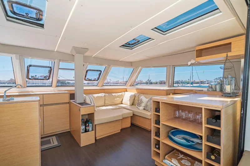 Slide: The Image of Luxurious interior of 2019 Nautitech 46 Open catamaran with panoramic windows and modern furnishings. - 19