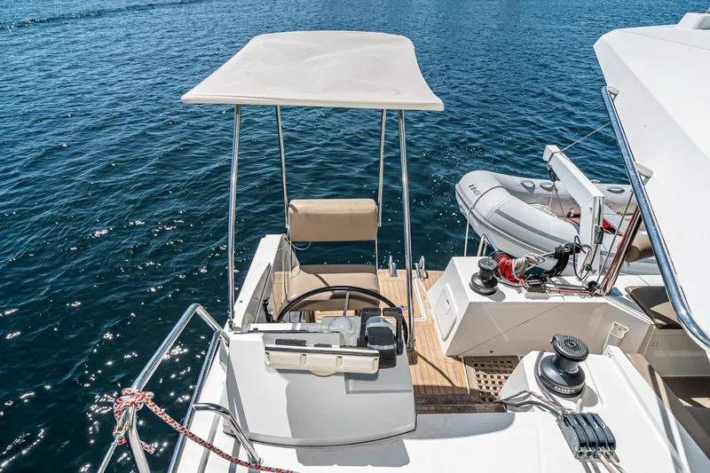 Slide: The Image of Helm station of 2019 Nautitech 46 Open catamaran with ocean view. - 26