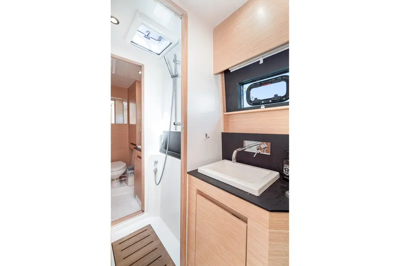 Slide: The Image of Modern bathroom interior of 2019 Nautitech 46 Open catamaran, featuring sleek design and fixtures. - 42