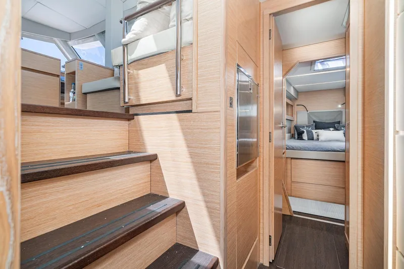 Slide: The Image of Interior of 2019 Nautitech 46 Open yacht, featuring modern wood finishes and cozy bedroom. - 37