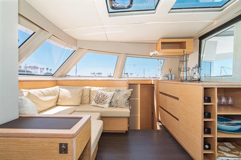 Slide: The Image of Luxurious interior of 2019 Nautitech 46 Open catamaran with panoramic windows and elegant furnishings. - 20