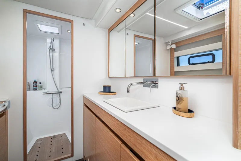 Slide: The Image of Luxurious bathroom in 2019 Nautitech 46 Open yacht with modern fixtures and wooden accents. - 36