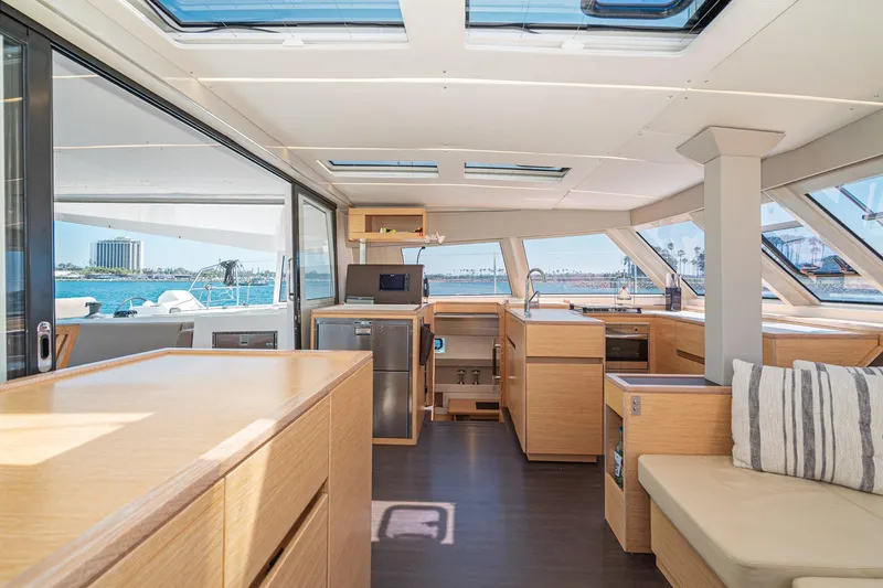 Slide: The Image of Interior of 2019 Nautitech 46 Open catamaran with modern kitchen and panoramic windows. - 14