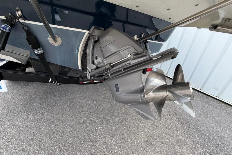 Slide: The Image of 2015 Glastron GS 289 boat stern drive and propeller on trailer. - 25