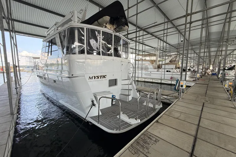 Slide: The Image of 1998 Hatteras yacht "Mystic" docked in a covered marina, Chattanooga, TN. - 9