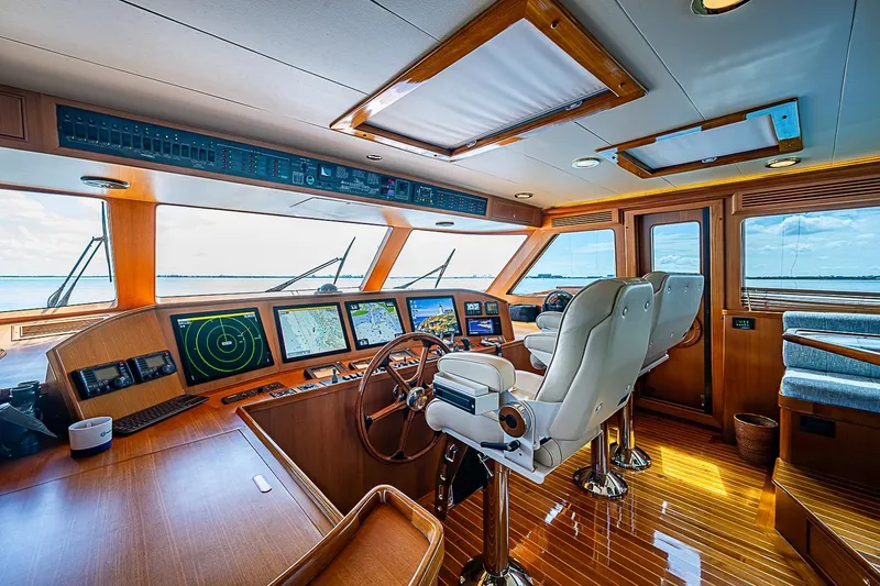 Slide: The Image of Luxurious helm of 2014 Marlow 80 Explorer yacht with advanced navigation systems. - 10