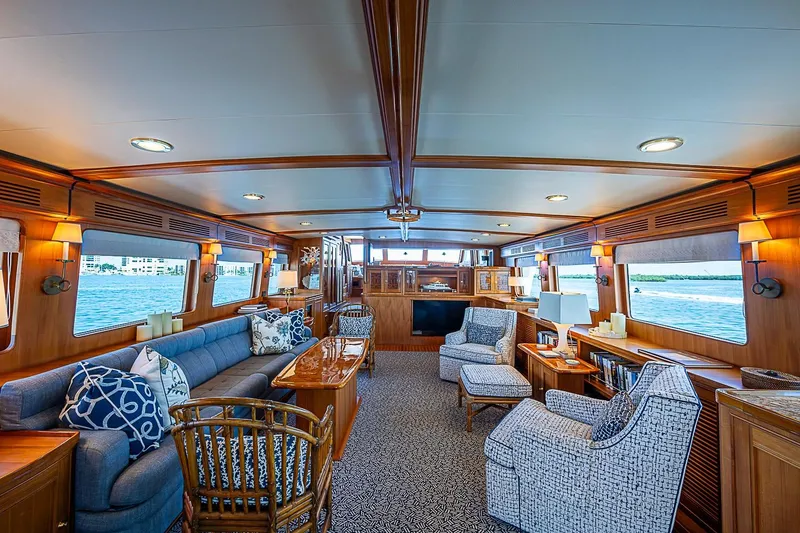 Slide: The Image of Luxurious interior of 2014 Marlow 80 Explorer yacht with elegant seating and ocean views. - 15