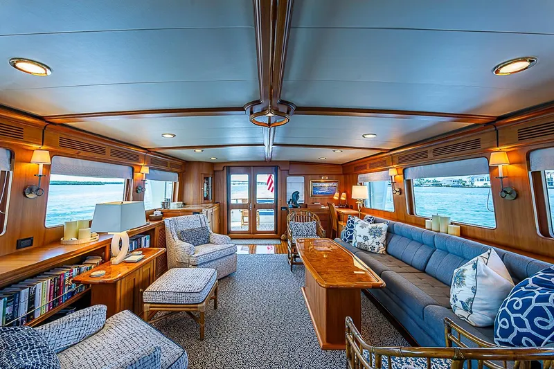 Slide: The Image of Luxurious interior of 2014 Marlow 80 Explorer yacht with elegant seating and ocean views. - 16